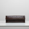 Leather clutch with belt strap
